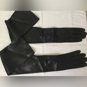Vintage Versace black leather gloves.